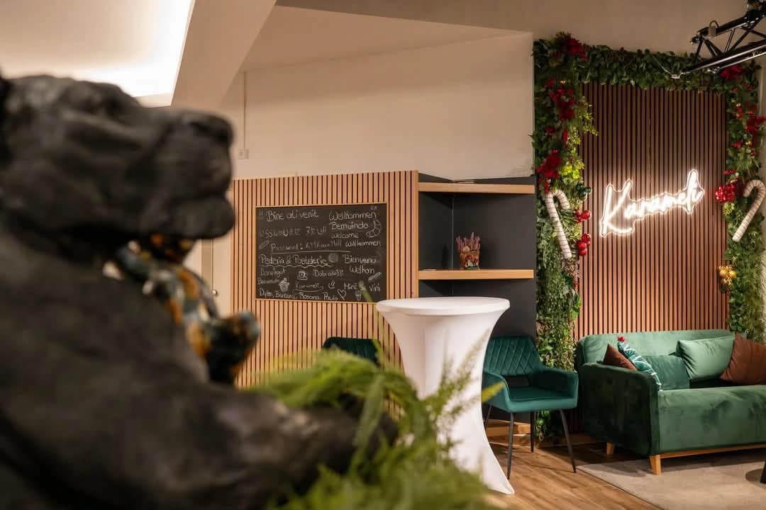 The warm, green interior of Karameli café